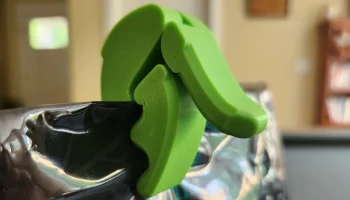 Зажим для сумки Curvy Cam Lock