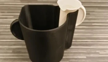 Drž&aacute;k ml&eacute;kovače s odkap&aacute;vačem - Delonghi Magnifica Evo (V... 9