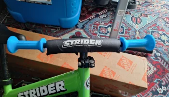 Ручка балансировочного велосипеда Strider...