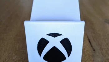 Двойная подставка для контроллера X-box...... 1