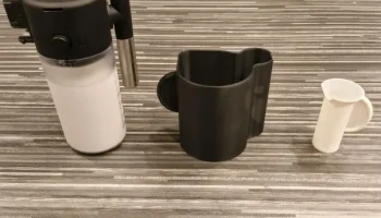 Drž&aacute;k ml&eacute;kovače s odkap&aacute;vačem - Delonghi Magnifica Evo (V... 7