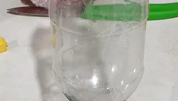 Автоматическая кормушка для рыбы с бункером для бутылок и... 1