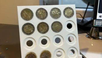 Подставка для монет на 16 монет достоинством 2 евро....... 1