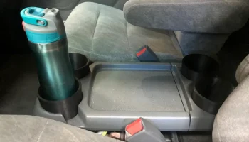 Honda Odyssey 2000 Адаптер чашки центральной консоли........ 1