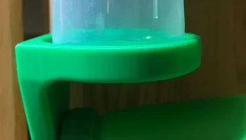 Слив из стакана для стирального порошка......... 5
