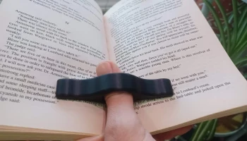 Кольцо для большого пальца держателя страницы книги......... Кольцо для большого пальца держателя страницы книги.........