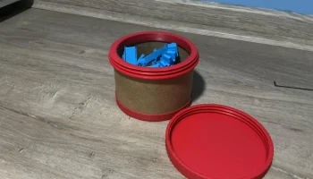 Хранение рулонов нити - конструкция с многоразовым картон...