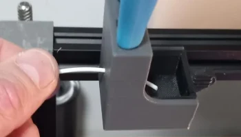 Крепление резака и бункер для нити...... 1