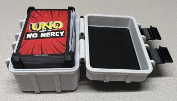 Коробка для колоды UNO Show 'Em No Mercy 1