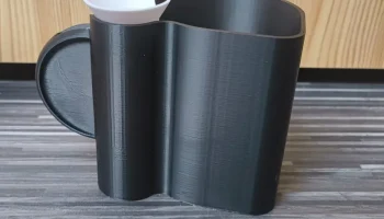 Drž&aacute;k ml&eacute;kovače s odkap&aacute;vačem - Delonghi Magnifica Evo (V... 2