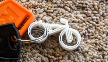 Велосипед/брелок с логотипом RadPower...