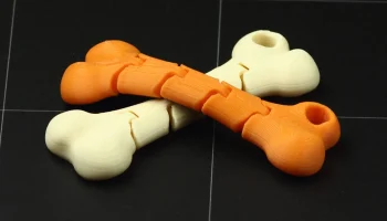 Гибкий брелок из кости 2
