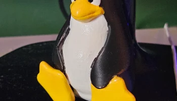 Смокинг без поддержки (талисман Linux-пингвина)......