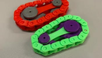 Полностью напечатанная на 3D-принтере велосипедная цепная...
