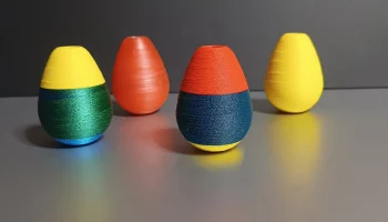 Яйцо с кувыркающимися лакомствами (игрушка для кошек)... 1