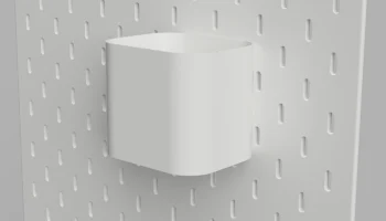 Коробка-контейнер Ikea Skadis из перфорированного картона...