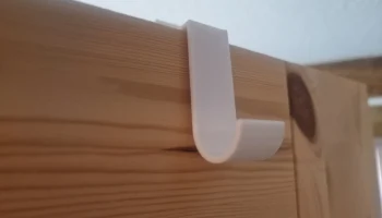 настраиваемый "обратный" дверной крючок