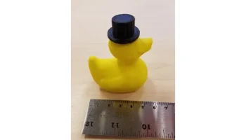Резиновая утка в цилиндре