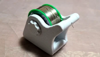 Держатель катушки с припоем