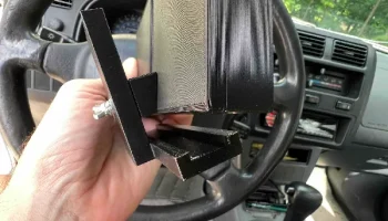 Держатель для телефона на рулевой колонке Toyota Rav4 199... 1