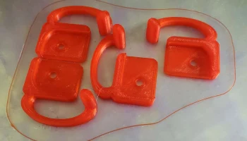 Зажимы для выравнивающих колес Ender 3......... 2