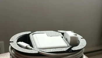 Держатель зарядного устройства для Macbook......