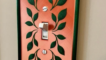 Крышка выключателя света с листьями.........