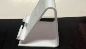 Подставка для iPhone с вырезом для зарядного устройства..... 5