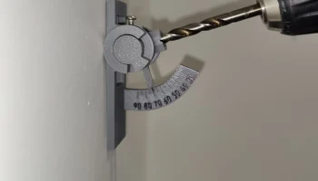 Регулируемая направляющая угла сверления...
