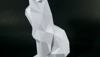 Низкополигональная сидящая кошка... 2